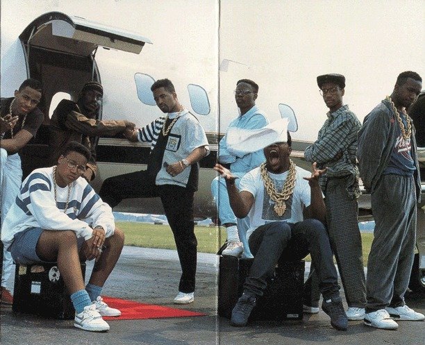 The Juice Crew on the back of In Control Vol. 1 . From left to right standing: MC Shan, Big Daddy Kane, Marley Marl, DJ Polo, Masta Ace and Kool G Rap. Seated: Craig G and Biz Markie. Courtesy of Cold Chillin' Records/Strictly Cassettes
