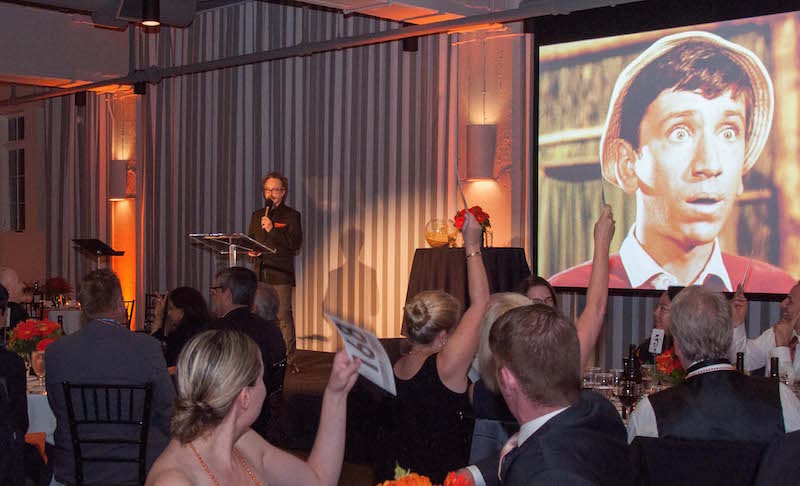 auGi speaking at Gala MS in Portland, OR. Photo courtesy of Fireworks Photography.