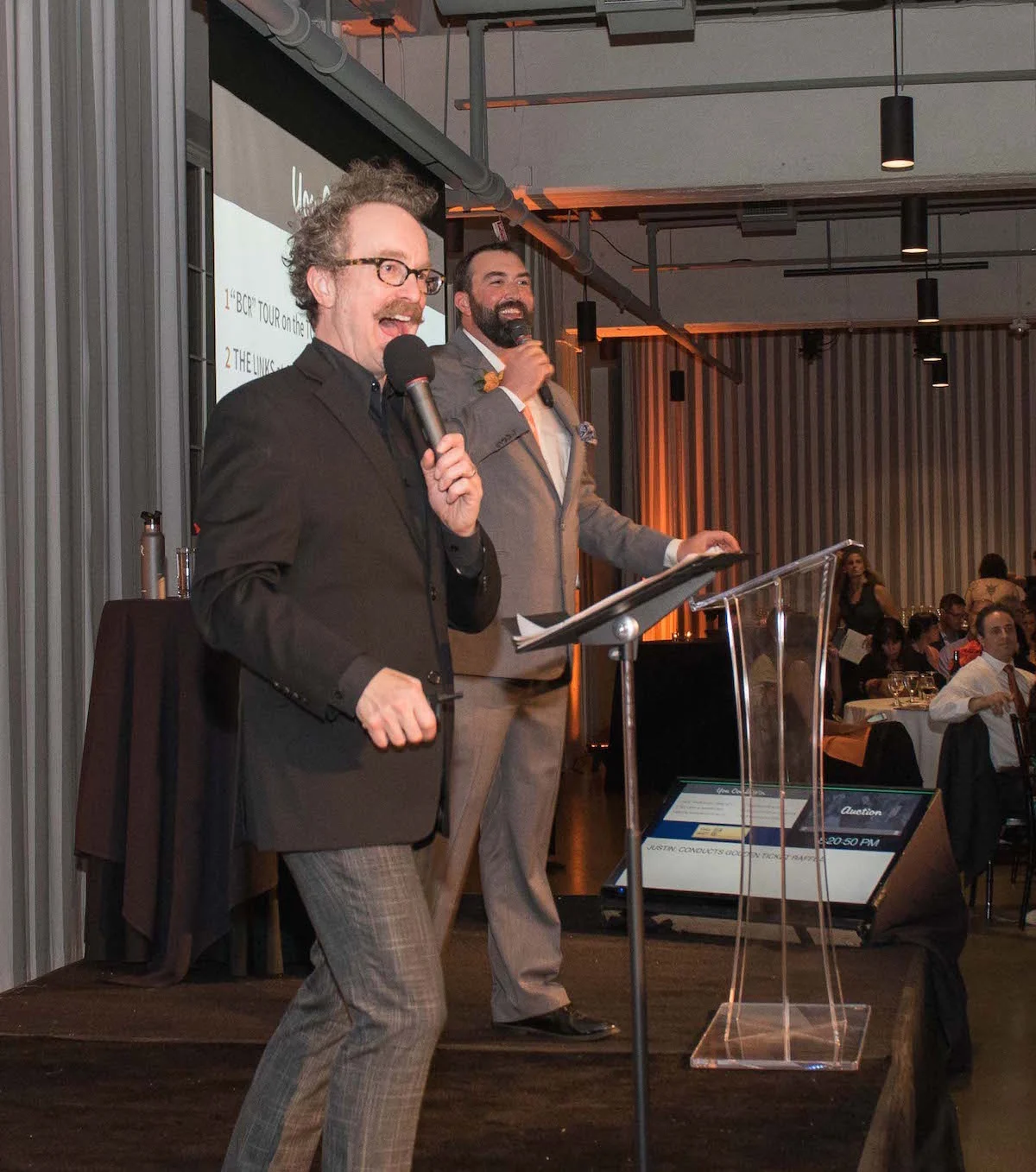 auGi with Justin Timm (auctioneer). Photo courtesy of Fireworks Photography.