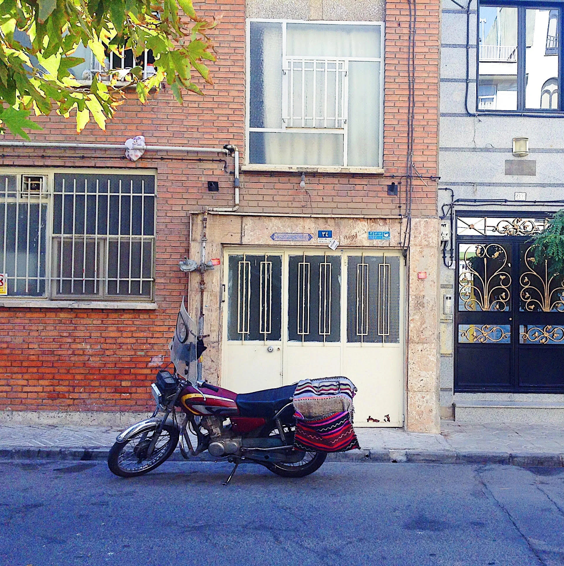 Solo parking in the Northern neighborhood of Tehran where we stayed. It was a bit far out but a very nice area, pretty quiet and really a suburb where people live, buy their groceries and go our for dinner and tea. 