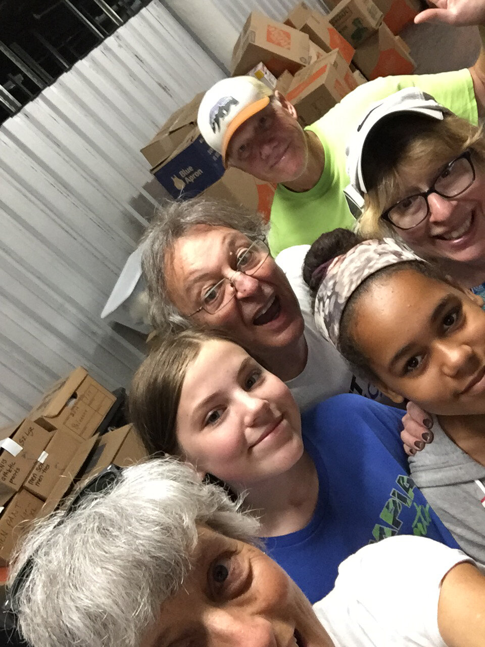 asylum seekers donations storage bin volunteers .JPG