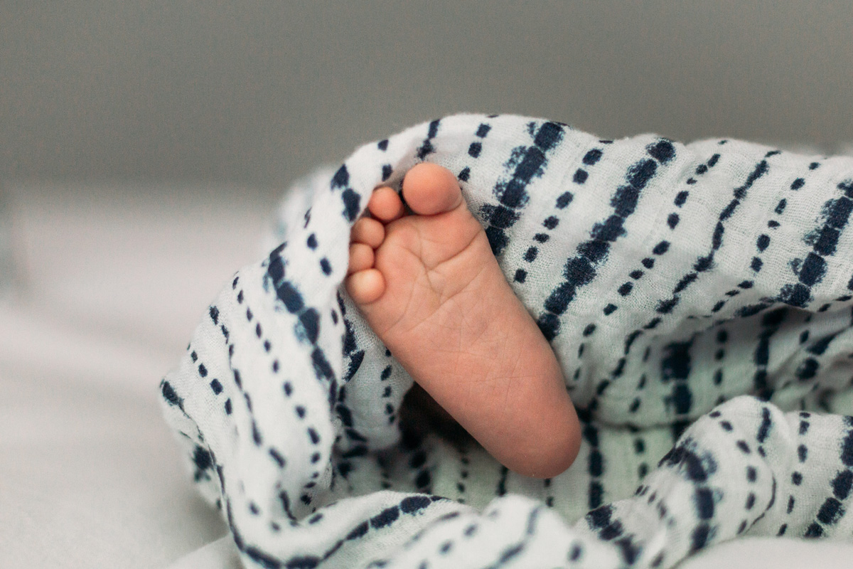 baby feet swaddled up - laura barr photography