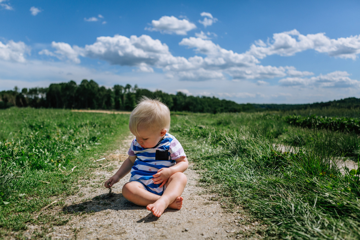 baby on a dirt road