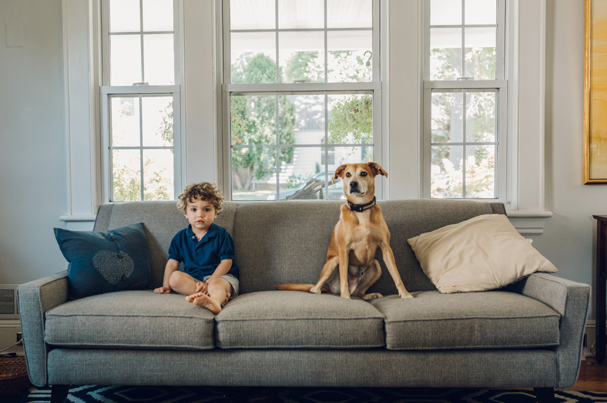 boy and his dog at home