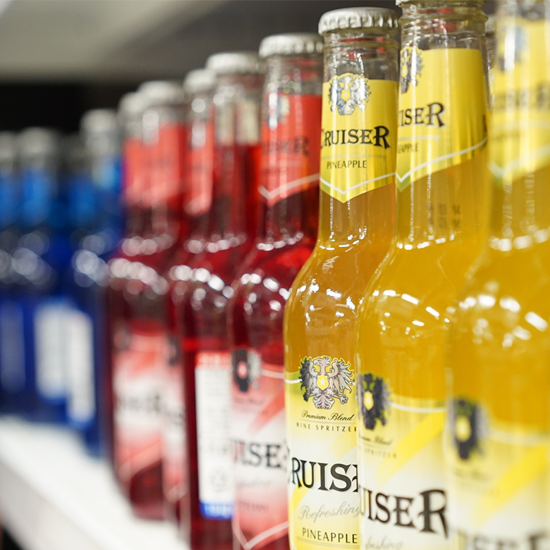 multiple alcoholic beverages on store shelves