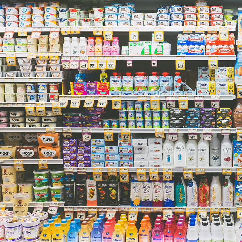 Dairy products on store shelf in supermarket