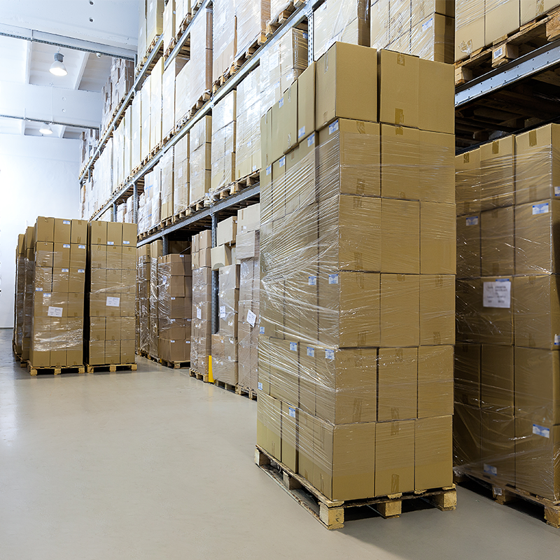 pallets in warehouse packed with stretch film wrap