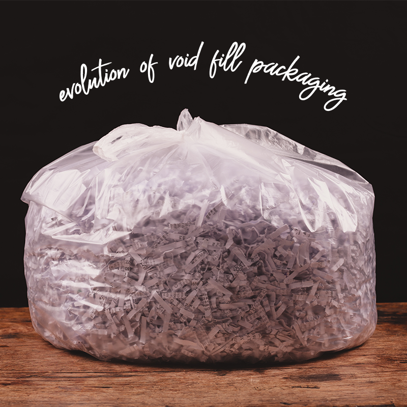 photo of a clear plastic bag filled with newsprint void fill