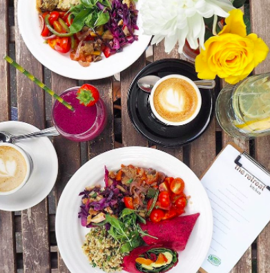 Vegan galore with fresh salad plates, Old Spike Roastery Coffee & fruit smoothies
