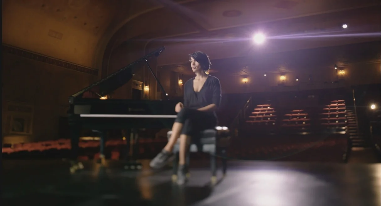 Ian's "Thumb-Print Flare Filter" is applied over this frame from Pussy Riot member Nadya Tolokonnikova's interview.
