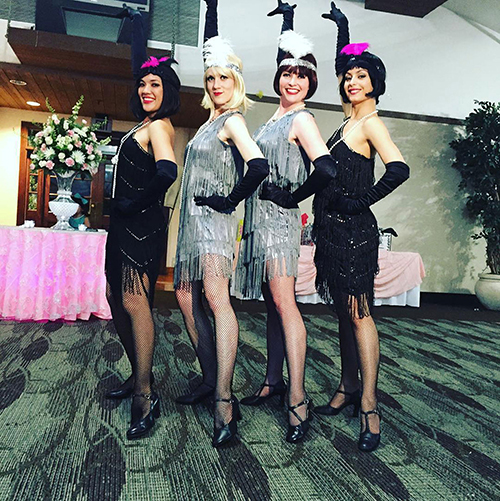 Four 1920s Flappers Dancers posing together