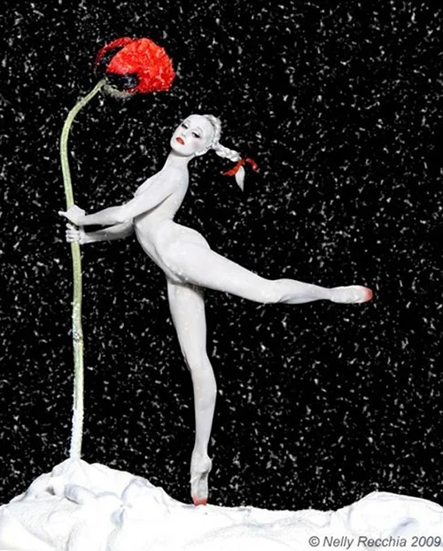Black and white dancer with red flower and accents