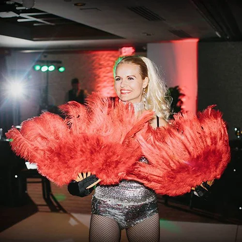 Dancer with red feathered fans