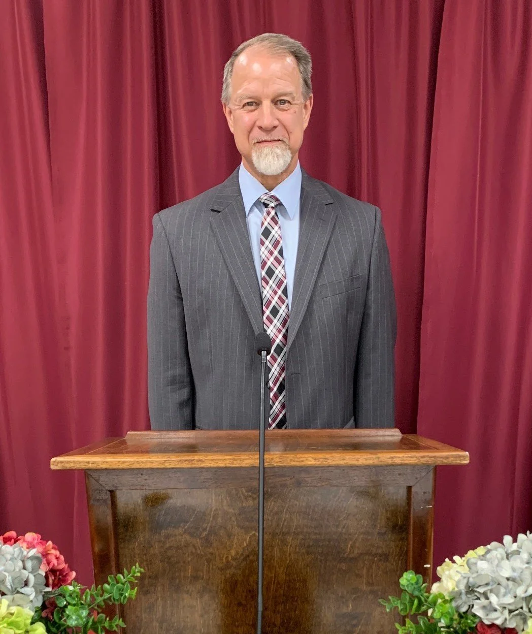 Pastor Wheat standing behind pulpit_cropped.JPG
