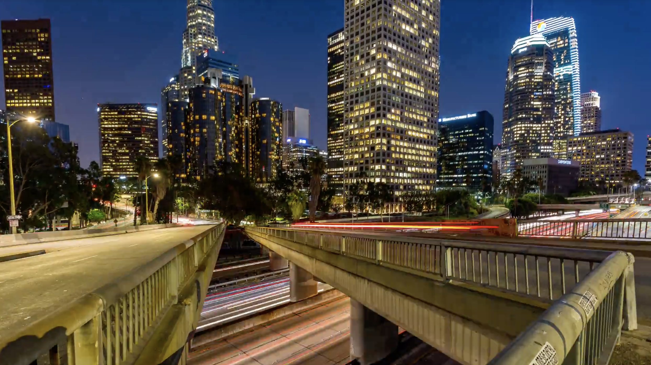 Downtown Los Angeles and Freeway Pan and Tilt Day to Night.png