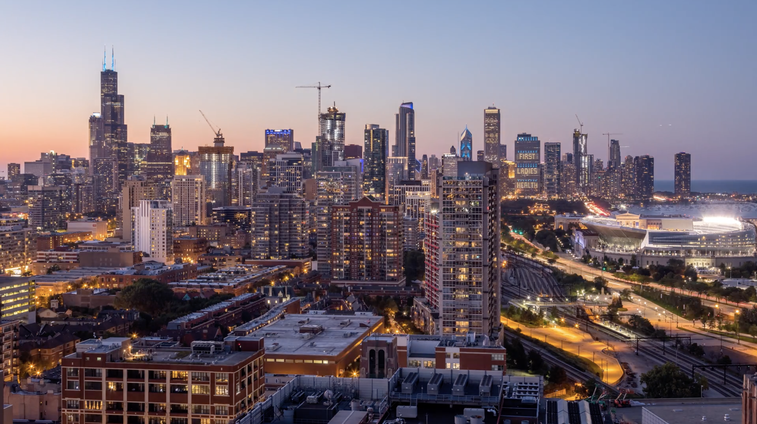 Chicago City Skyline Day to Night Sunset.png