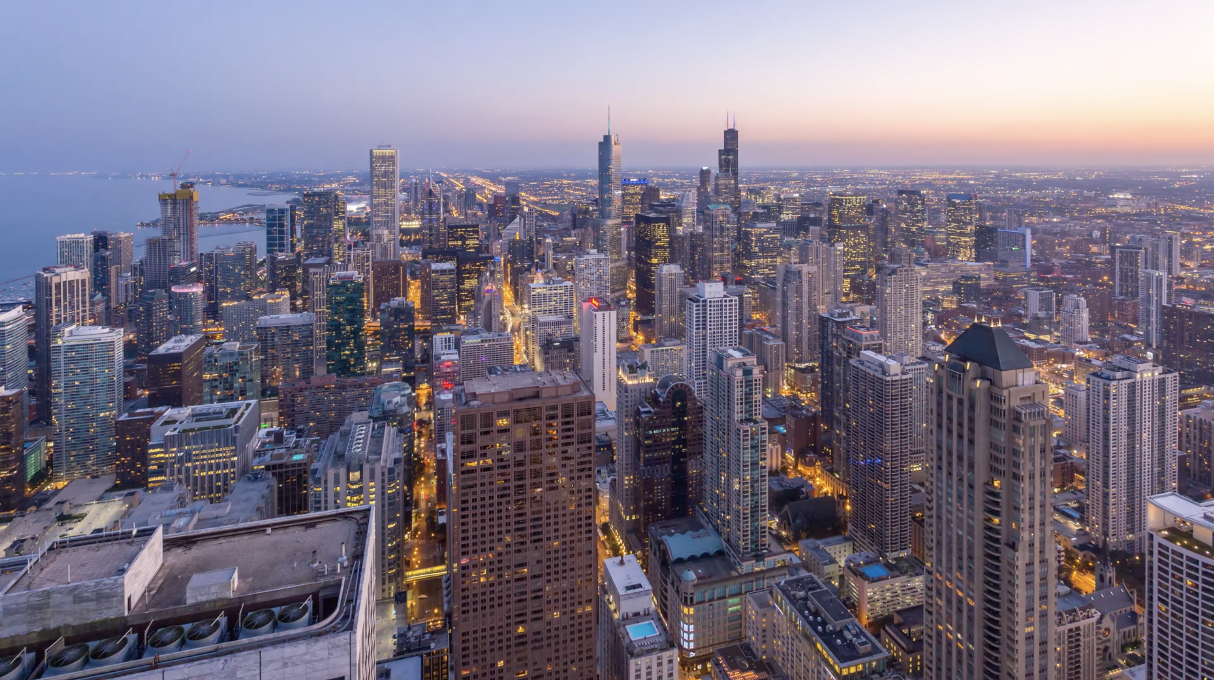 Downtown Chicago Aerial Day to Night Sunset.png