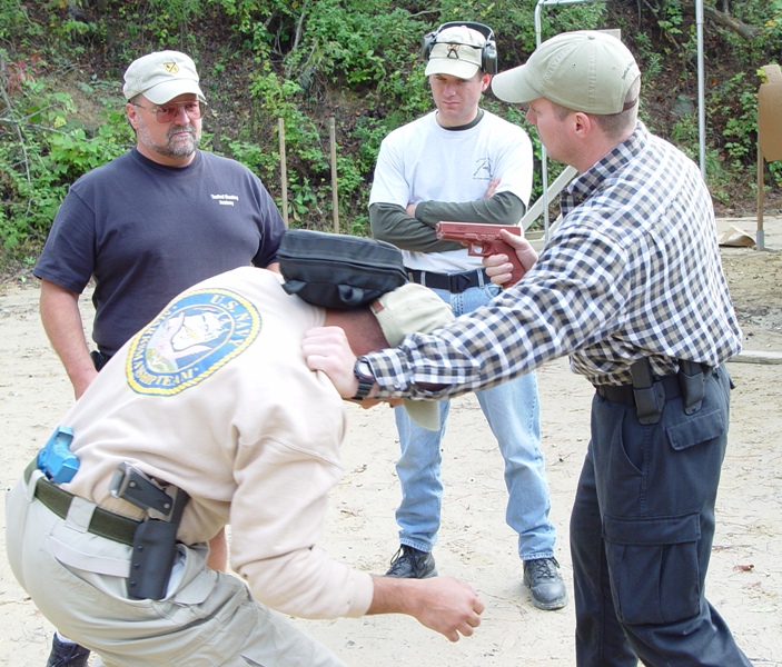 D.R., Kevin Apland & Rick Simes Studying Handgun Strikes with Paul Sharp of Sharp Defense