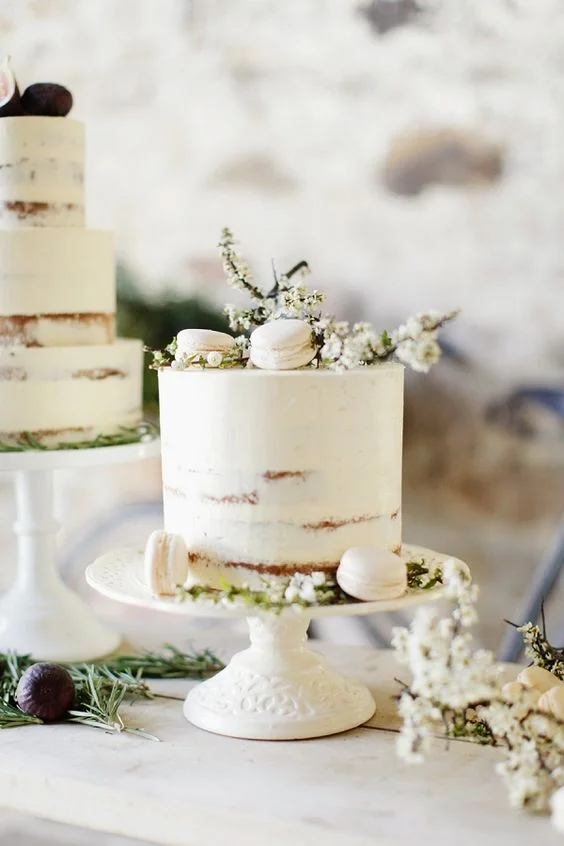 Simple + elegant cake with cherry blossoms + macaroons.