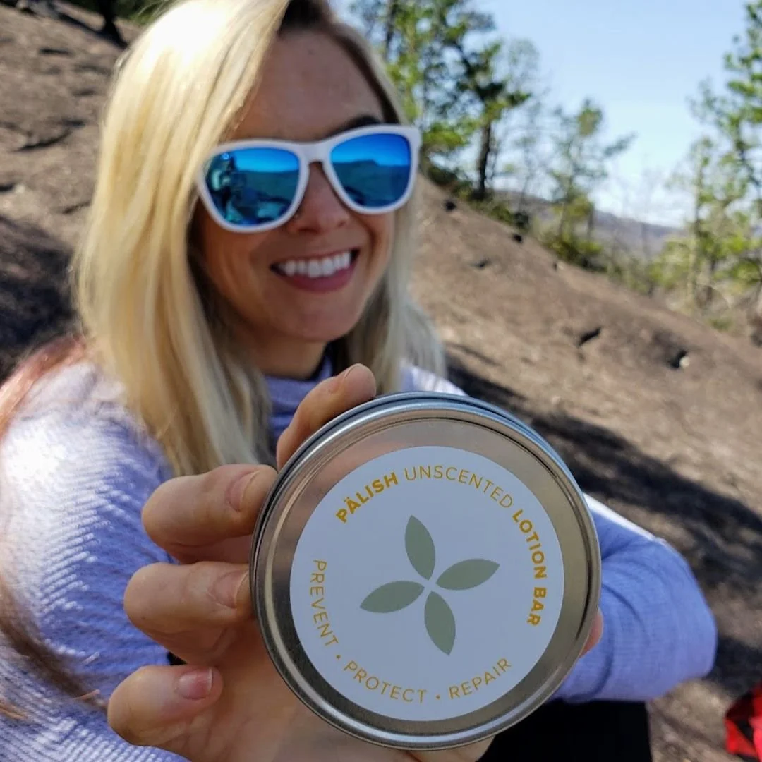 Girl holding the lotion bar in Ashville tennessee on a mountain for the purest kind of hydration made in small batches in ohio .jpg