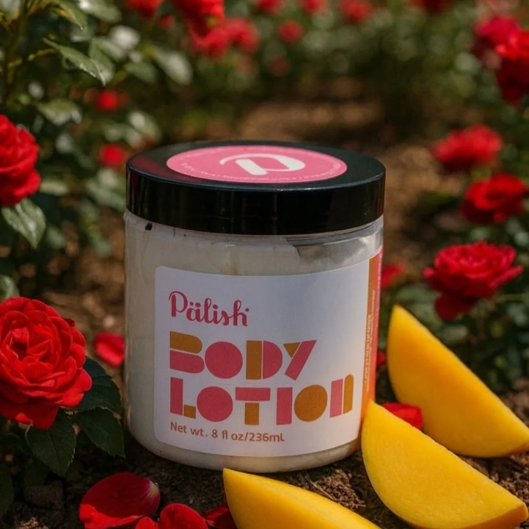 Surrounded by roses and mango slices is the luxurious body butter lotion by palish in columbus ohio is made with clean ingredients for ultra hydration .jpg