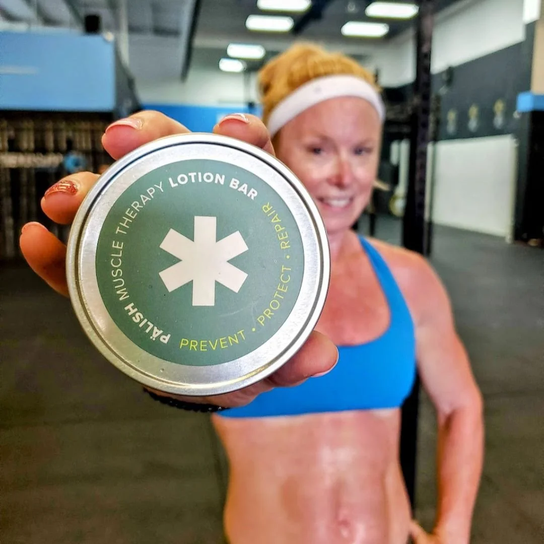 girl holding the muscle therapy lotion bar by palish natural skincare in columbus for after gym care and hydration .jpg