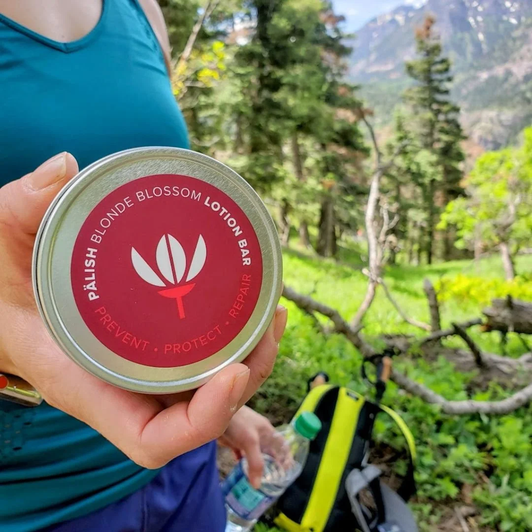 Girl holding the lotion bar by palish in telluride colorado is a great travel lotion that can go anywhere with you. .jpg