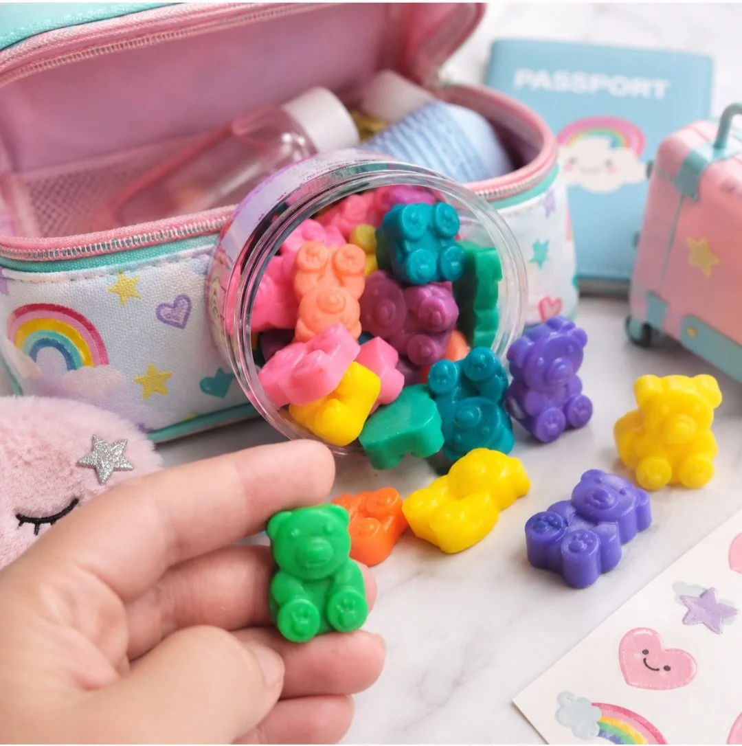 Girl holding the mini natural bear soaps by palish in ohio made with clean ingredients and fruity flavors.jpg