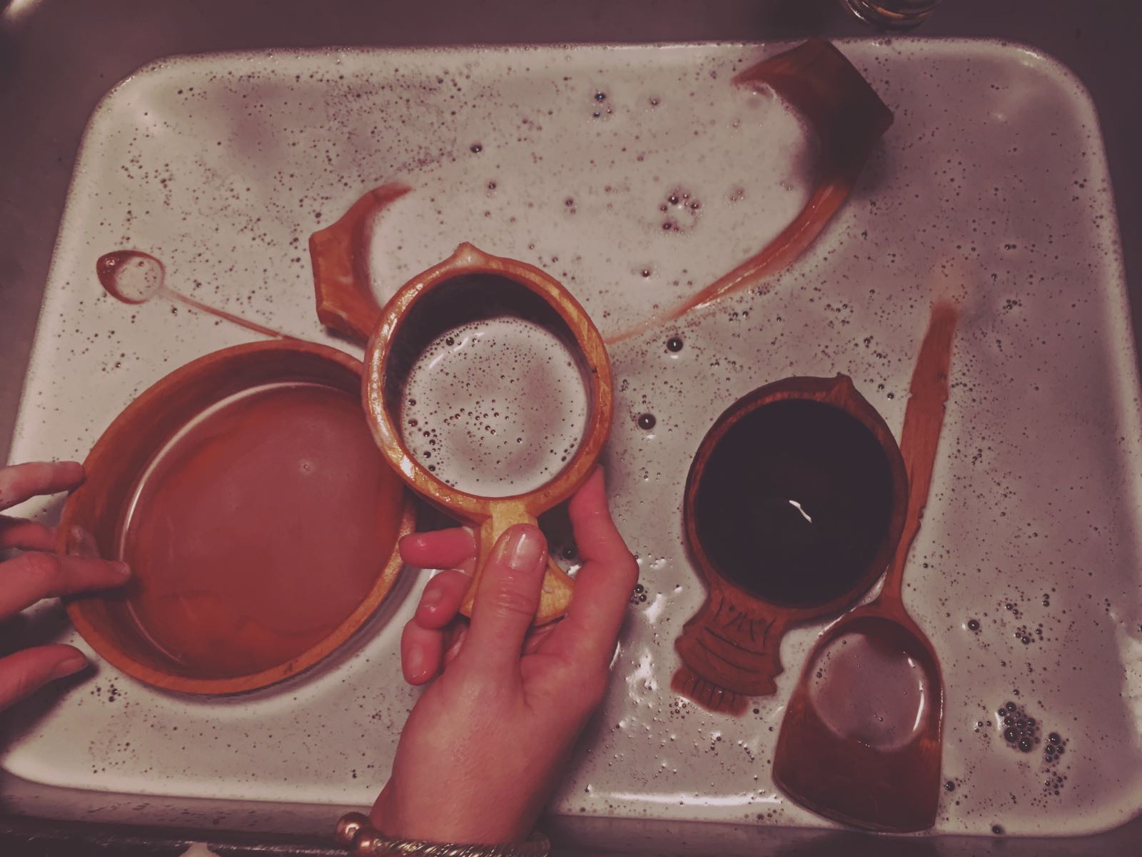 Warm soapy water for cleaning handmade wooden items