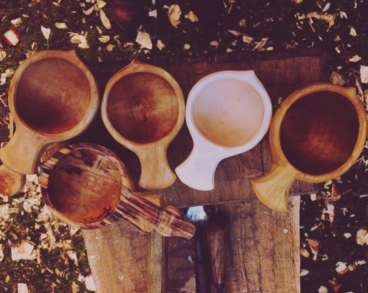 Freshly carved White Birch Kuksa (second from right) next to a 6 month old Kuksa (far right) - well loved with daily morning coffee.