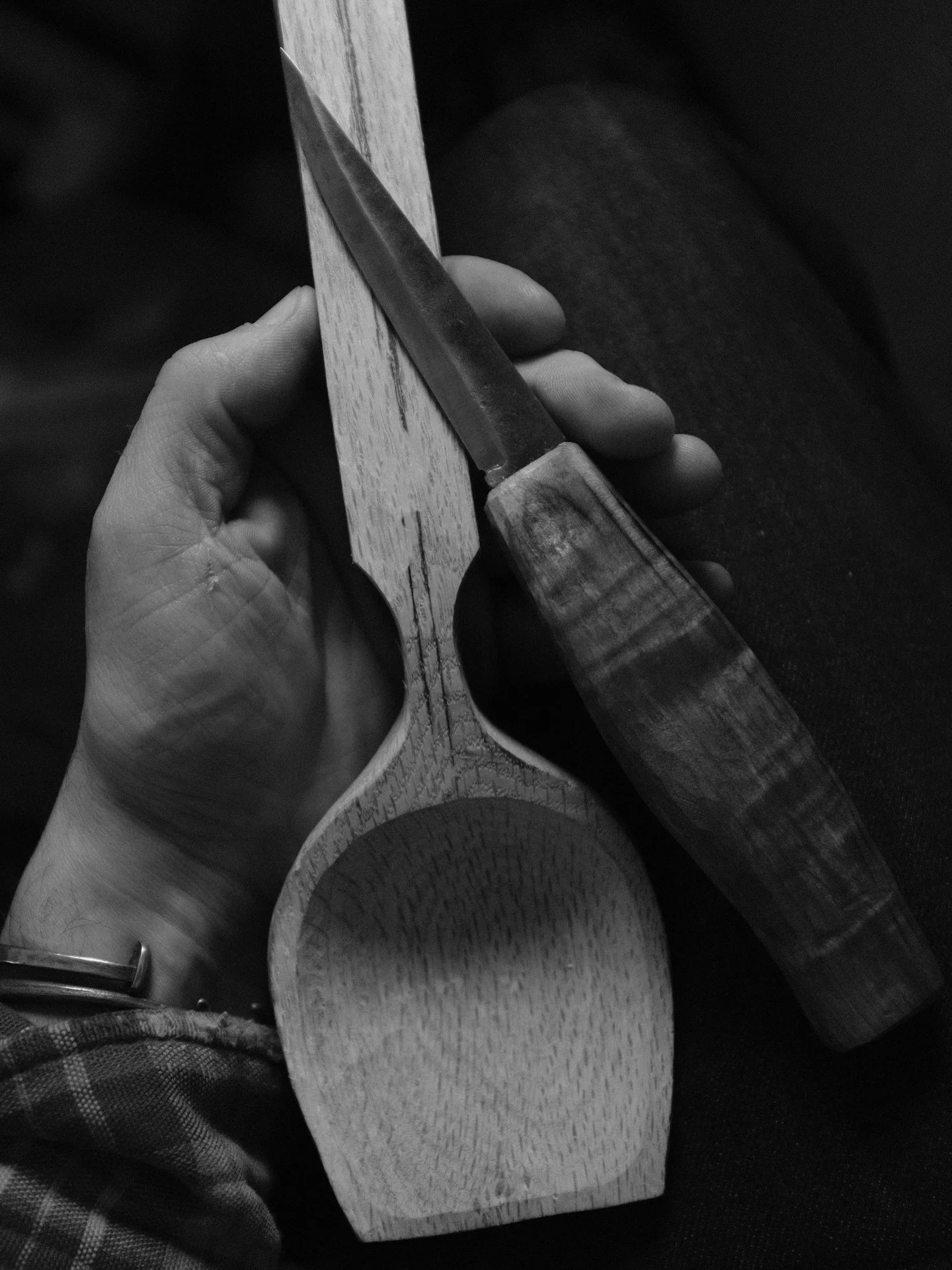 Carving a cooking spoon in red oak that smells just like ketchup.