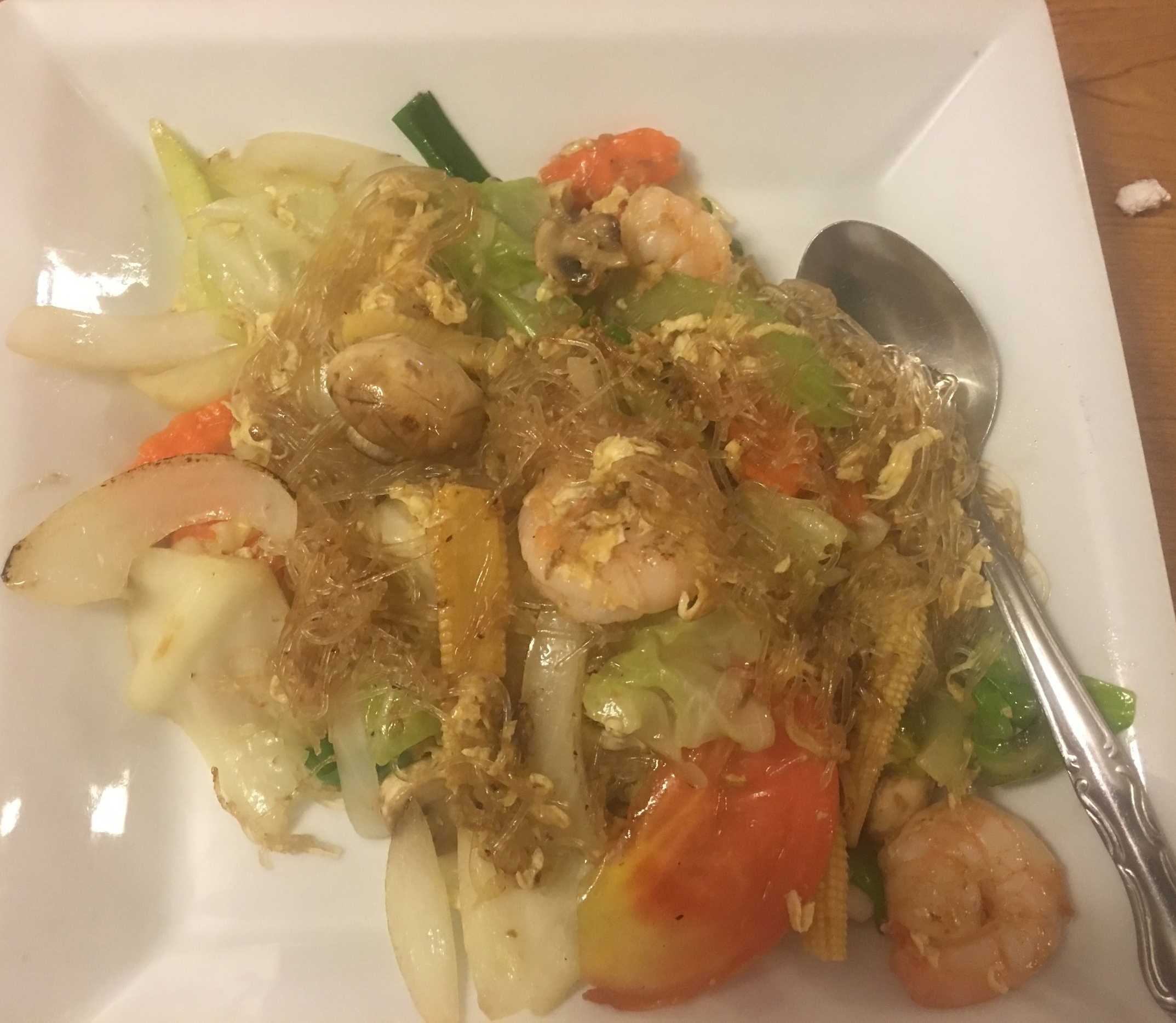 Glass noodles: and white bean noodles with eggs, onions, baby corn, cabbage, tomatoes, and mushrooms with shrimp 
