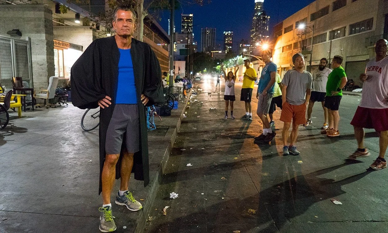 judge in robes on skid row.jpg