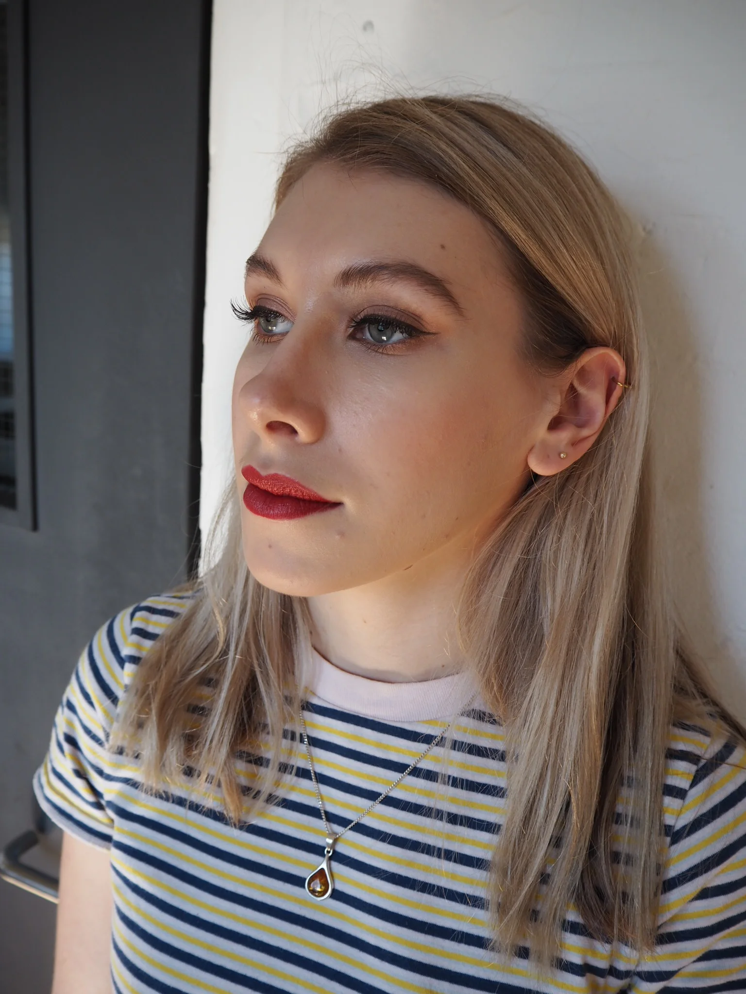 Kitten flick and red lip special occasion makeu