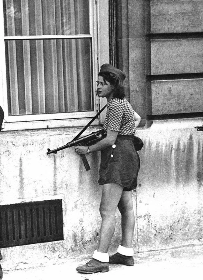 Simone Segouin was a French Résistance fighter. This picture was taken on 19 August 1944