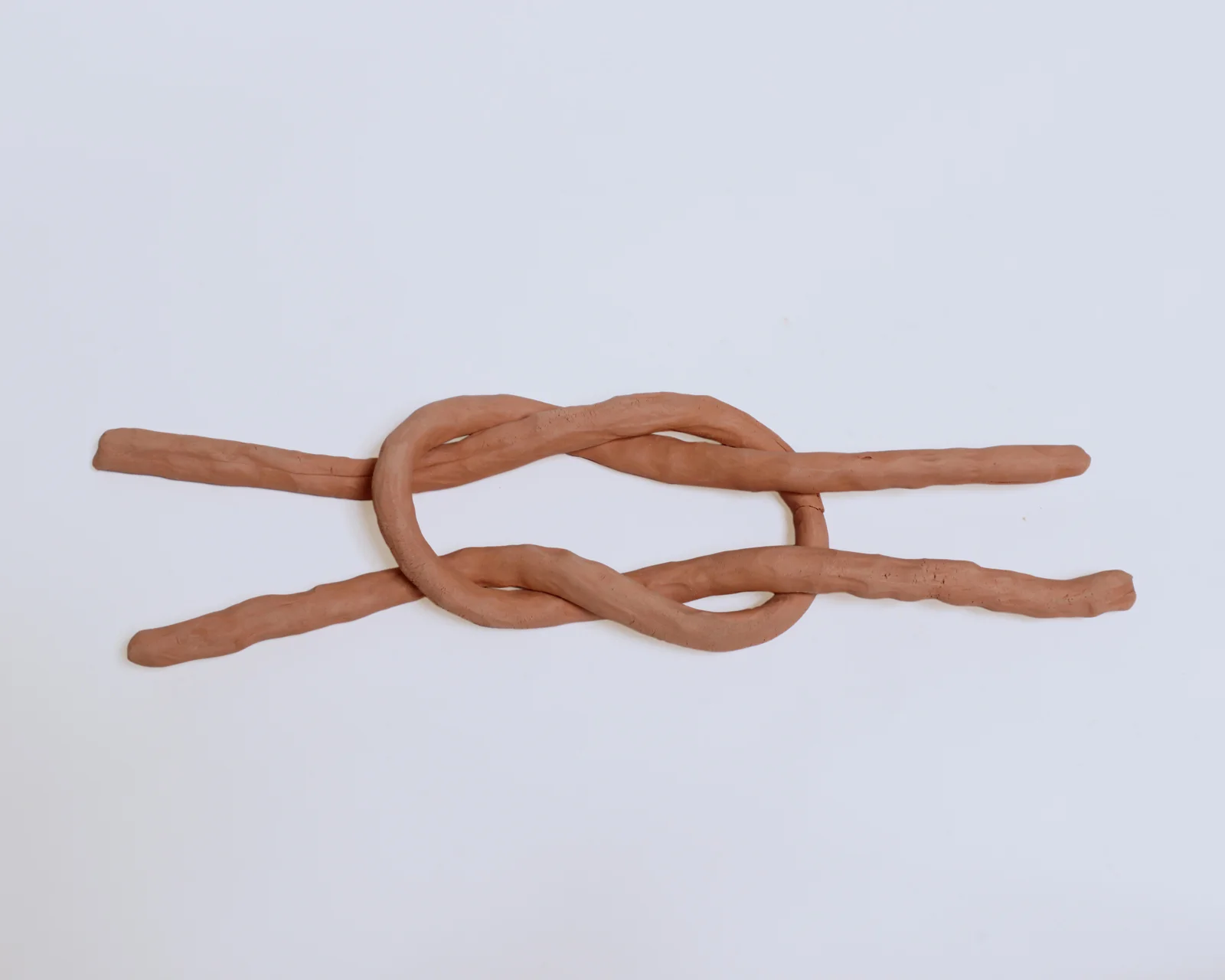 Square Knot #1 (balanced) 2015, terra cotta, 14" x 5" x 1"