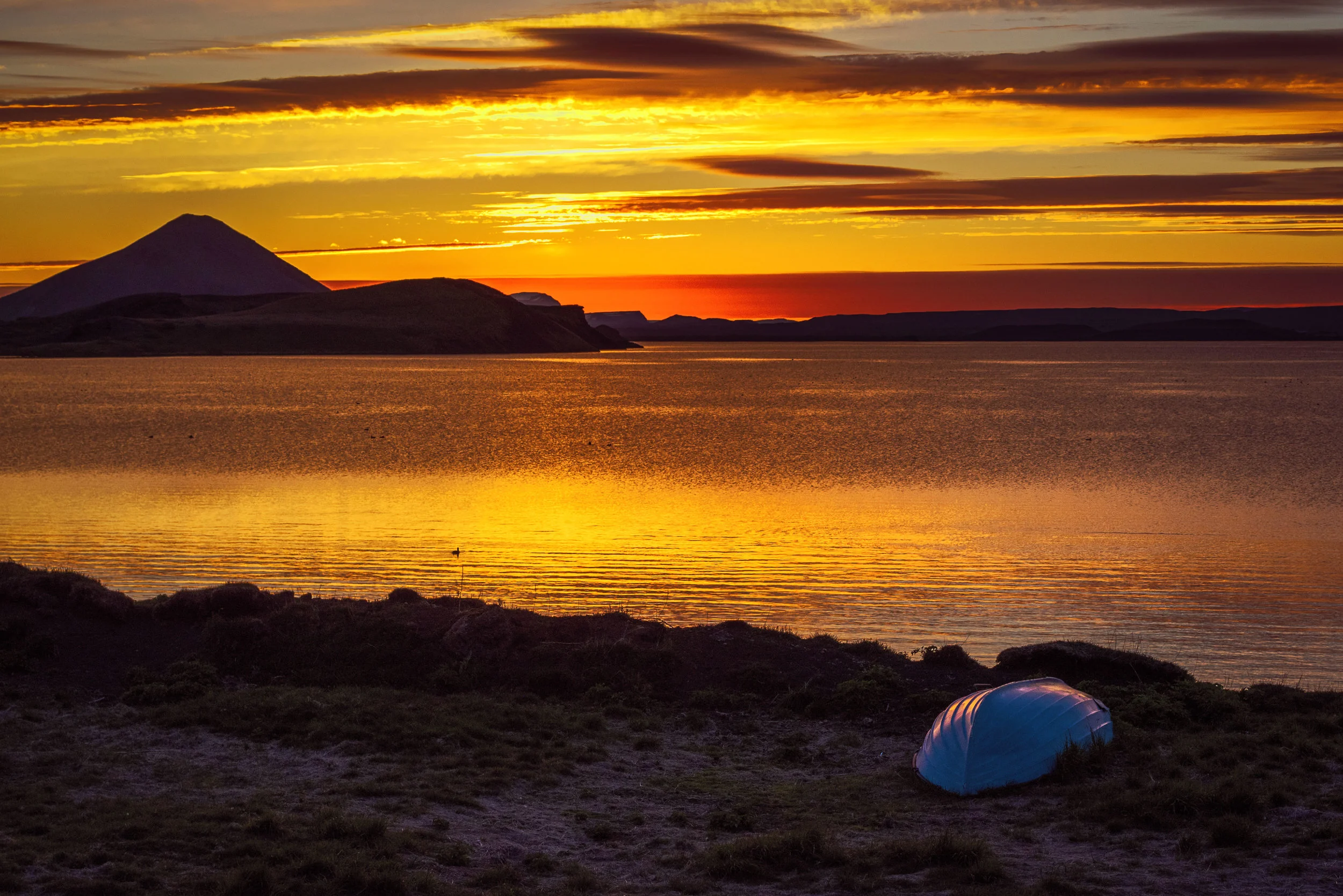For my next trip to Iceland, I would love to figure out a way to rent this boat and take it out on the water at this time of night
