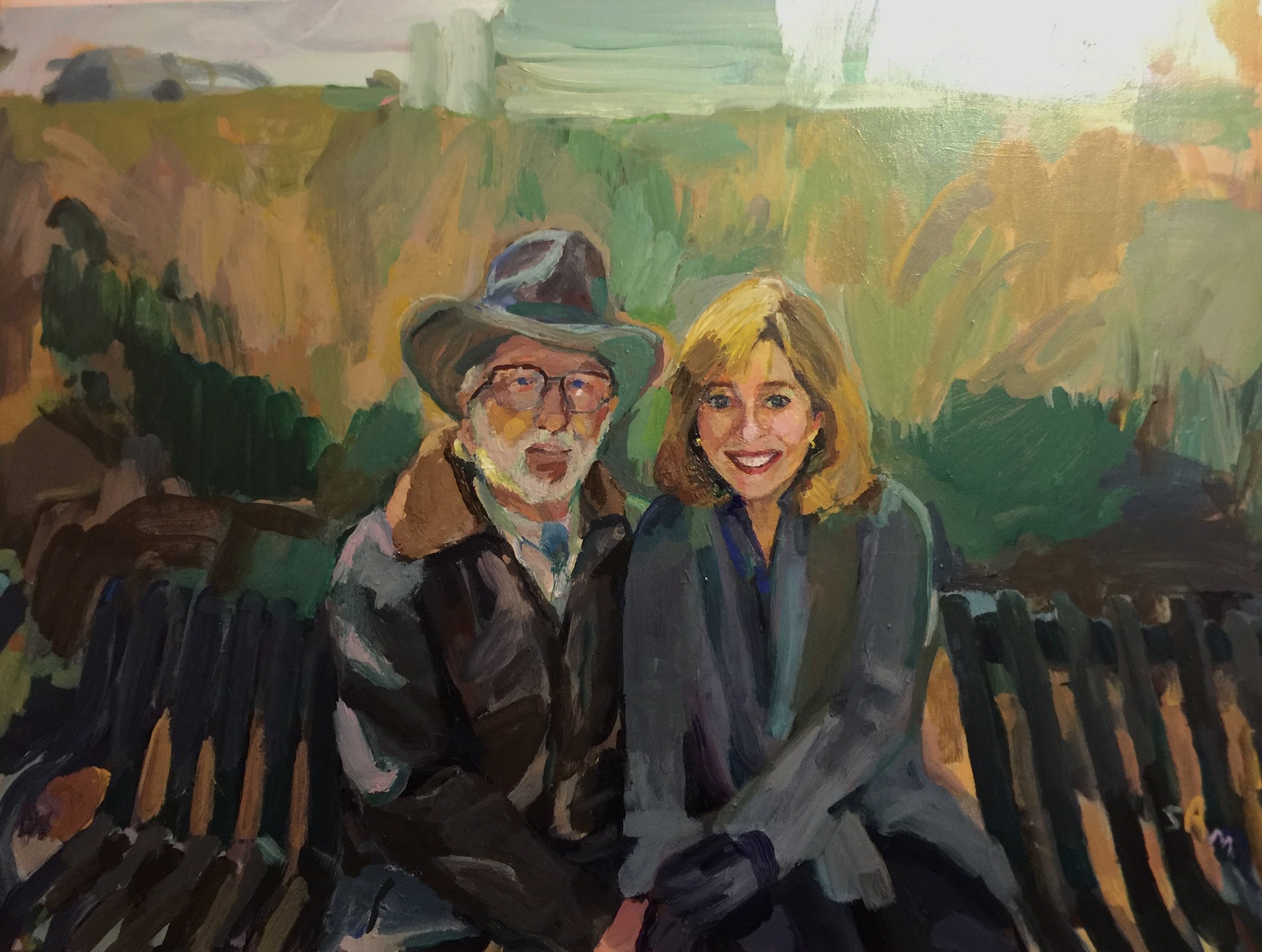 cowboy man and wife on bench.jpg