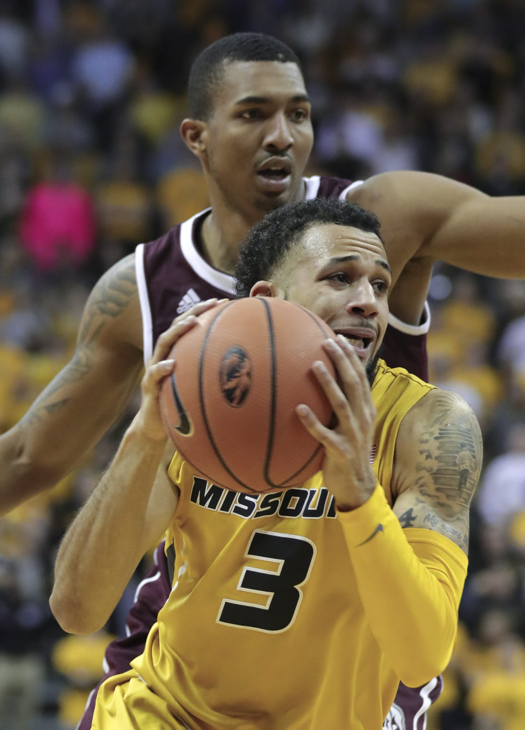  Kassius Robertson drives the ball while Xavian Stapleton chases during Missouri's 89-85 overtime victory over Mississippi State on Saturday, Feb. 10, 2018 at Mizzou Arena. Robertson scored a team-high 22 points.&nbsp; 