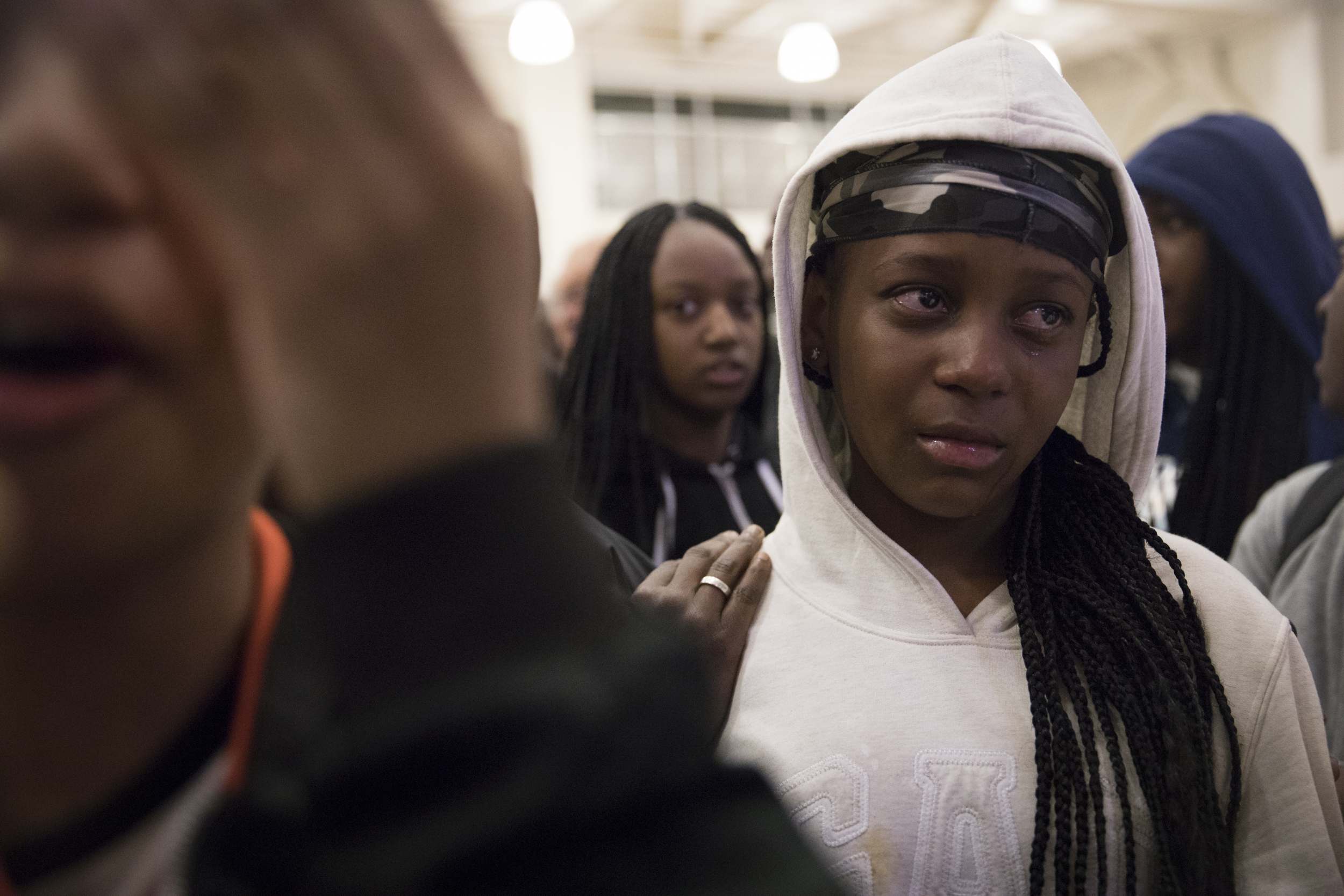 Merlei Cherry, 12, a seventh-grader at Roots International Academy, cries after Oakland Unified School District voted 6-1 to close Roots on Monday, January 28, 2019. The school will close at the end of this school year. Students will be transferred to nearby schools.