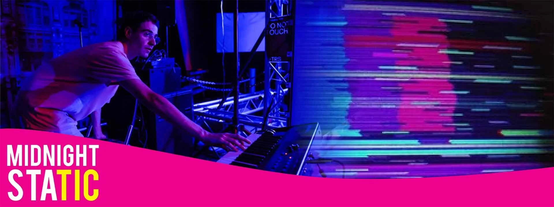 A man reaches out towards a piano. Text Midnight Static
