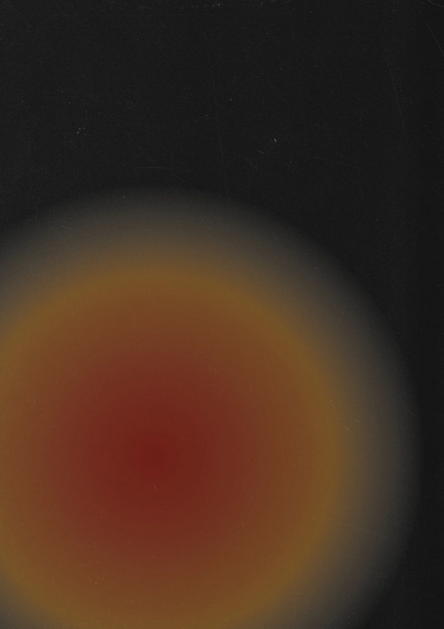 Blurred abstract gradient background with dark top transitioning to warm reddish-brown bottom.