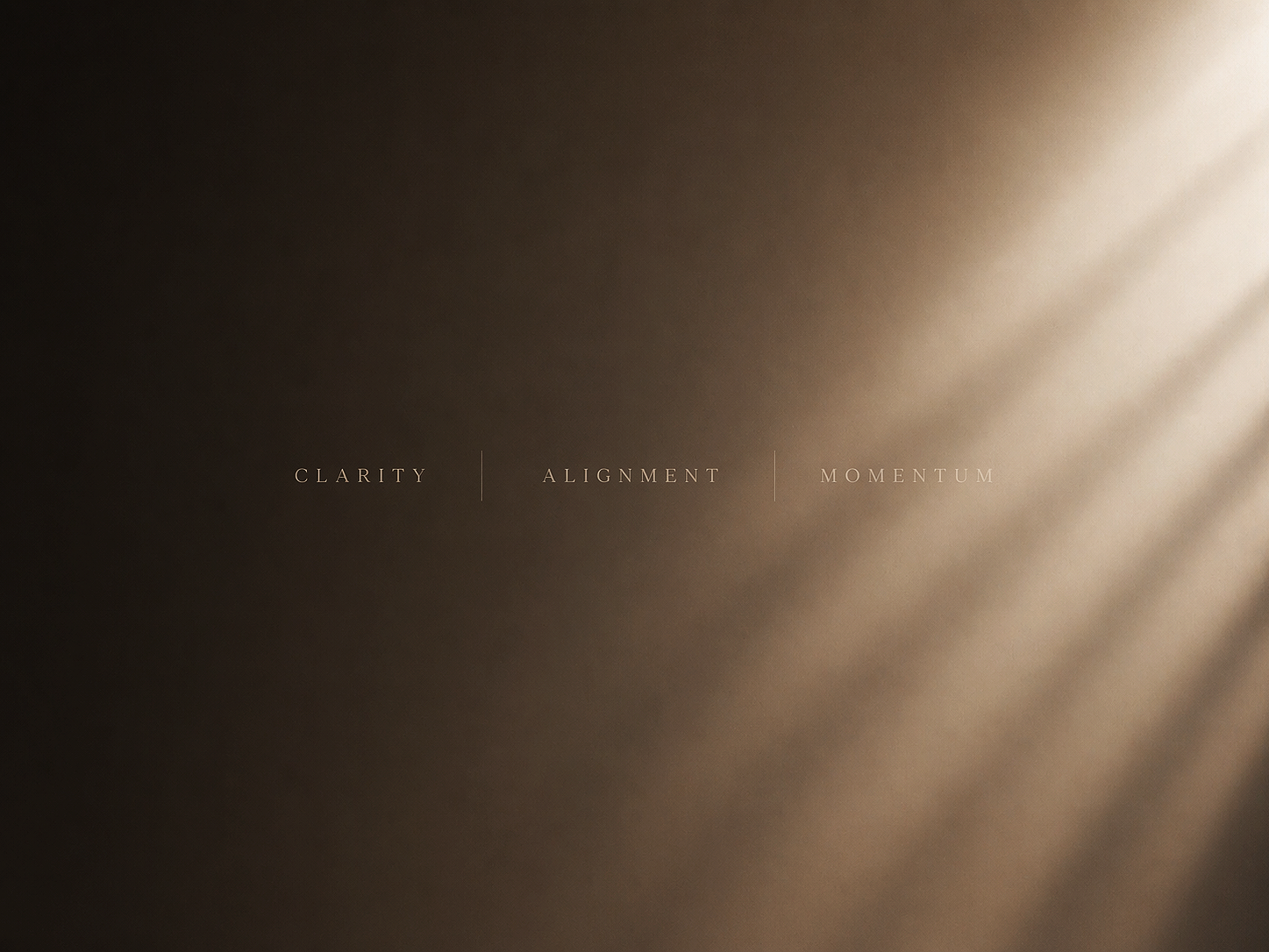 Soft light shining through a textured surface with the words 'Clarity | Alignment | Momentum' in the center.