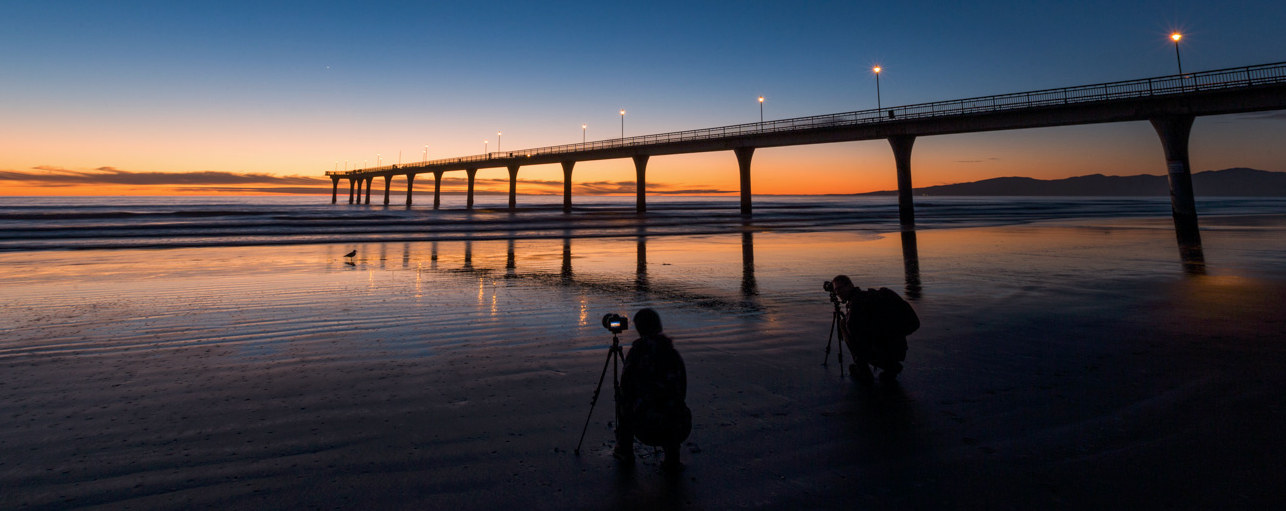 Some students capturing a beautiful sunrise.
