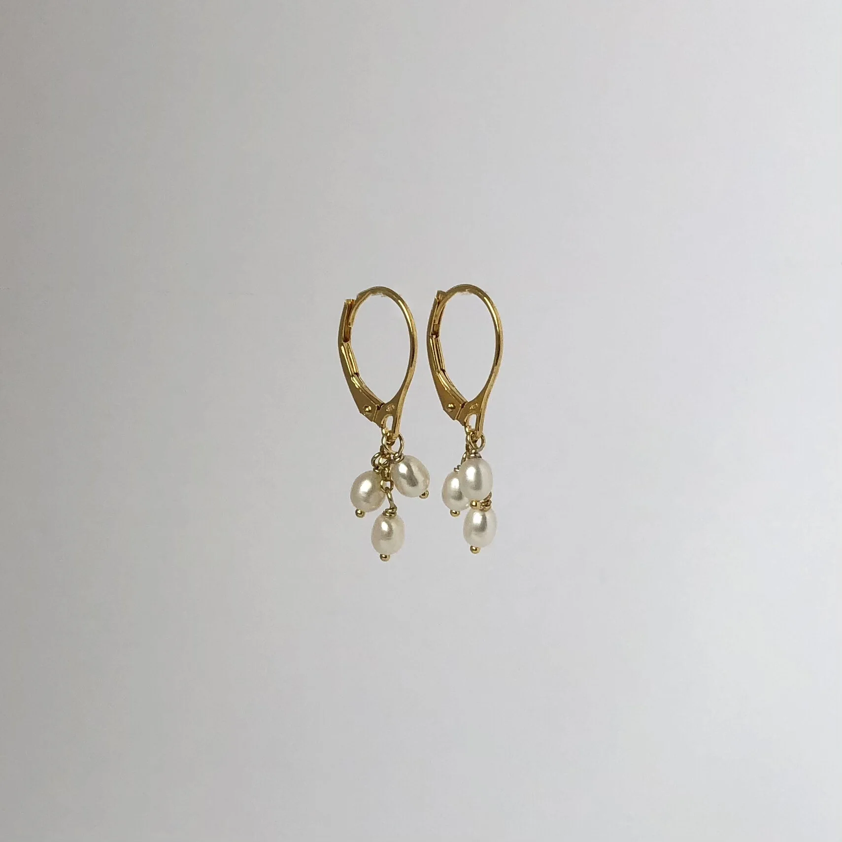 gold trinity pearl drop earrings 1