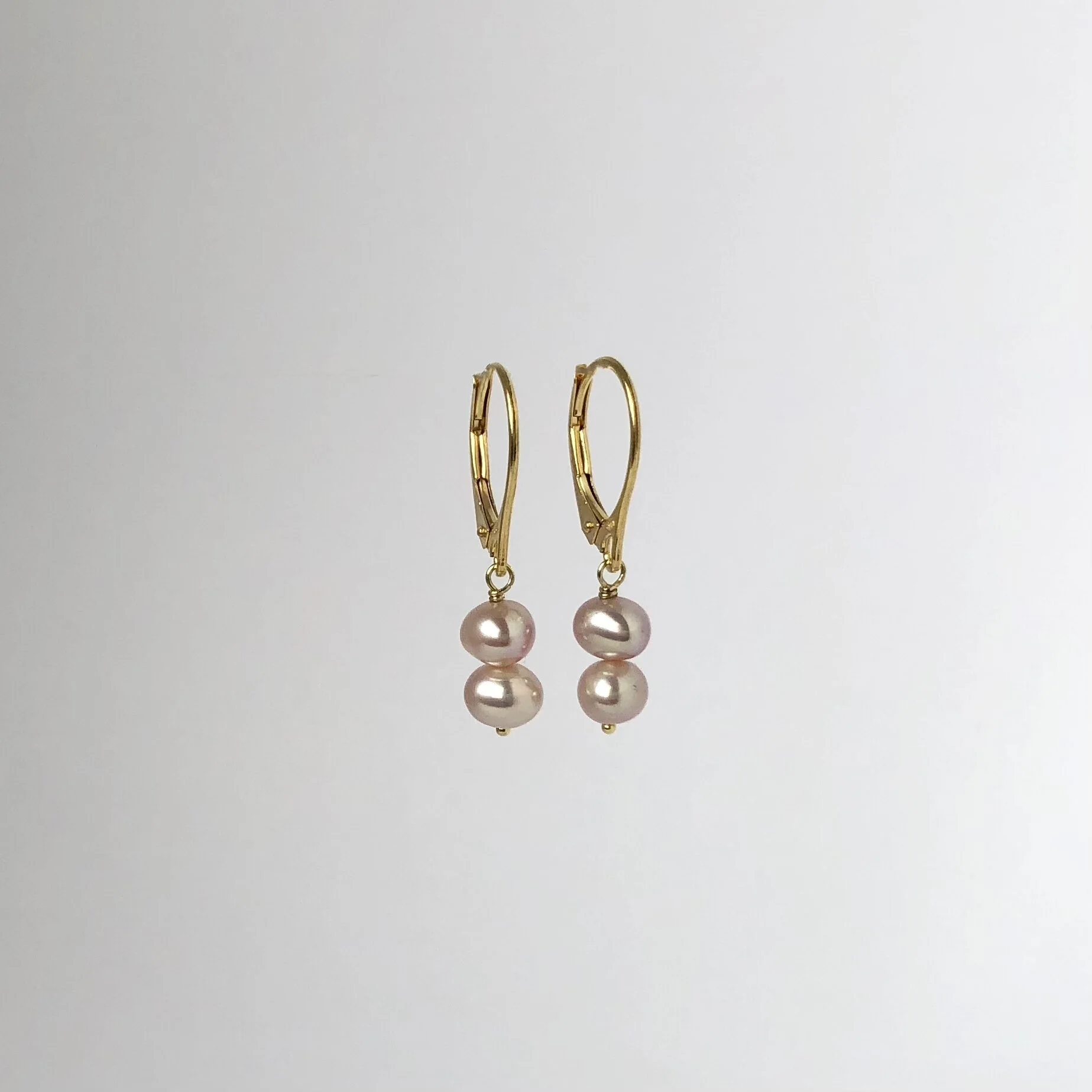 Gold duo drop earrings pink pearl