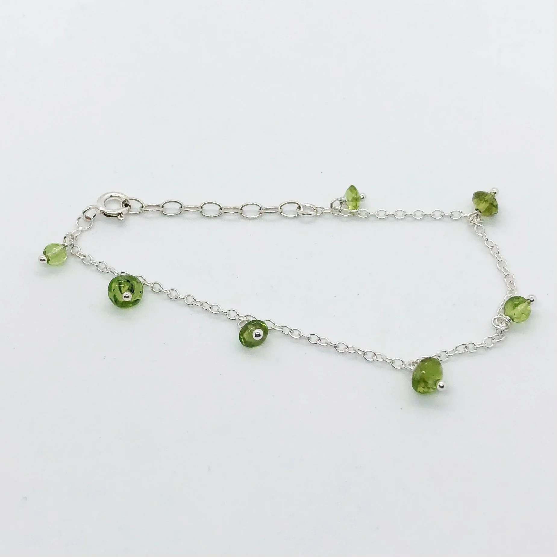 Silver and Peridot Charm Drop Bracelet