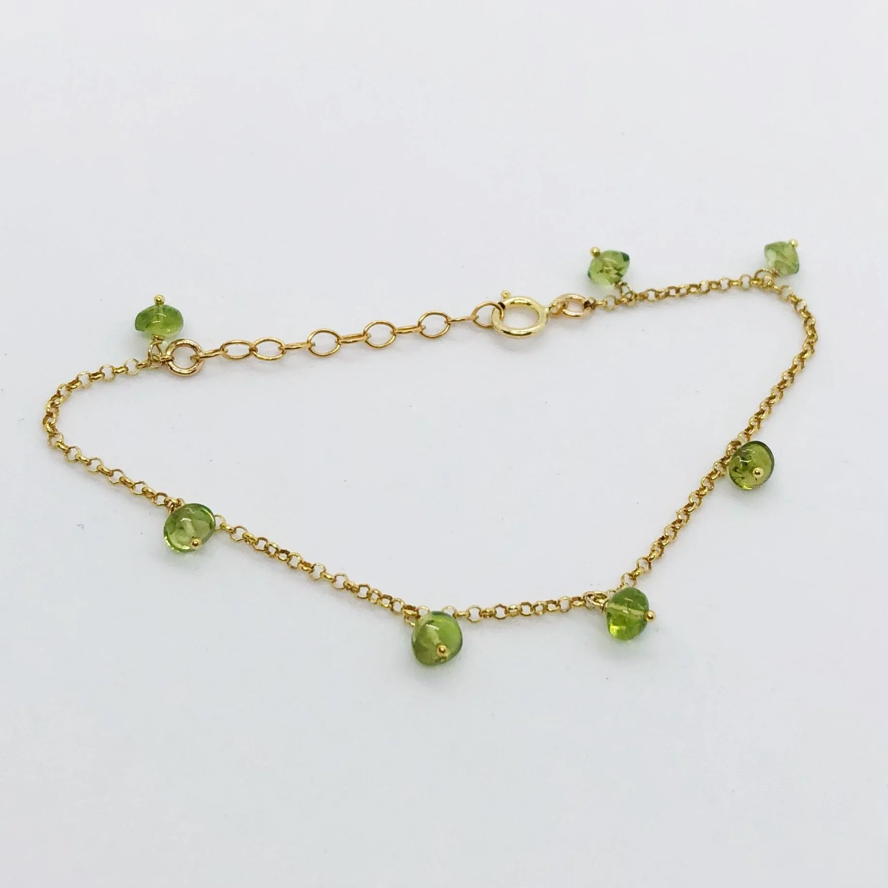 Gold and Peridot Charm Drop Bracelet