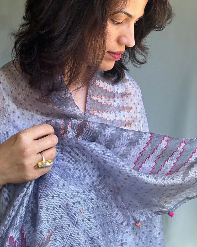 Woman wearing Kota silk scarf