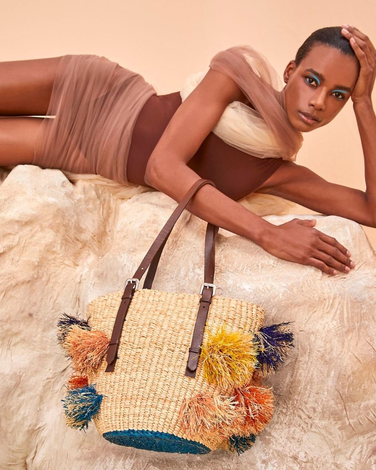 Blacken call fist 15 Sustainable Beach Bags Crafted with Natural Fibers | Conscious Fashion  Collective